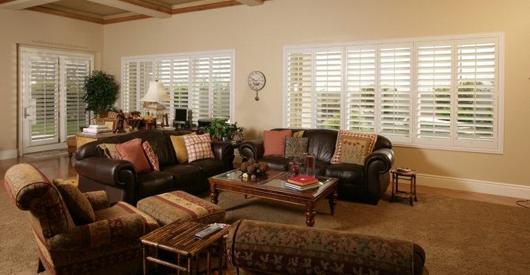 Tampa sunroom with interior shutters.